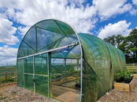 Afdeknet serre bevestigen met spanelastiek met bol