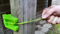 Rubberen lijnspanner – fluogroen – antislip blokje voor metskoord